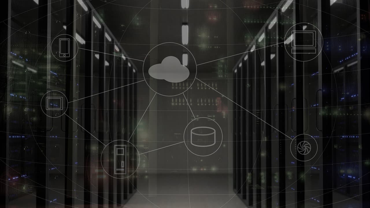 Rows of illuminated server racks in a data center, representing the cloud and AI infrastructure now central to Alibaba's valuation story.