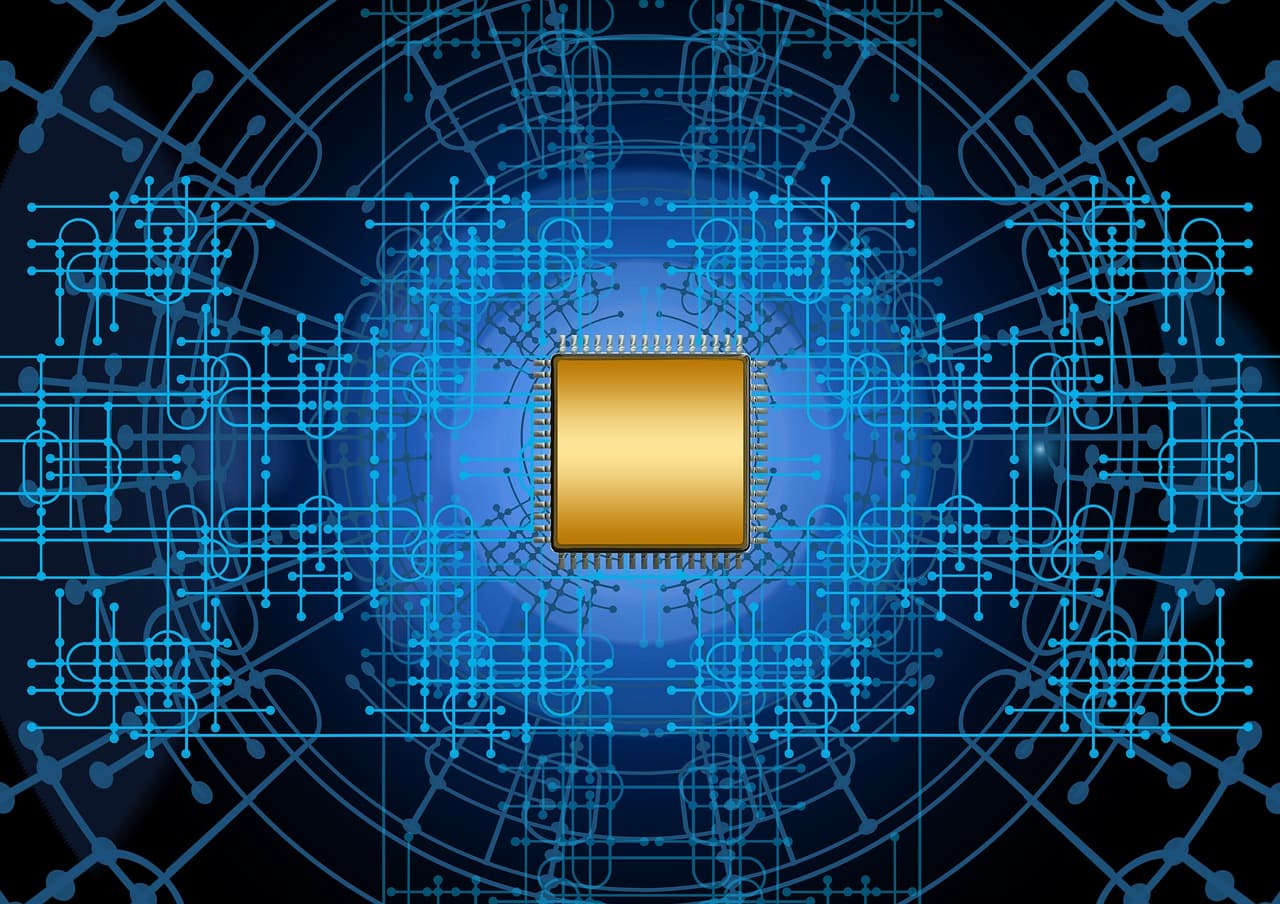 An illustrated gold microchip glowing at the center of a radiating blue circuit-board pattern, representing the AI chip demand driving Nvidia's earnings and the broader semiconductor market.